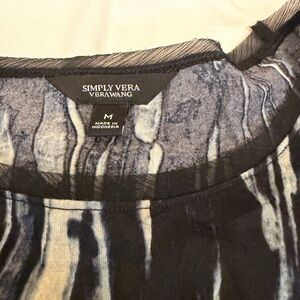 Simply Vera Wang Feminine and Pretty Lace like or styled for grunge. Versatile